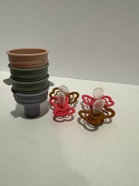 4 Bibs supreme Pacifiers pink and brown and 4 bottle funnels